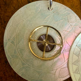Antique engraved Mother-of-pearl and watch spring earrings