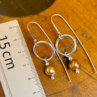 Gold pearl and silver earrings