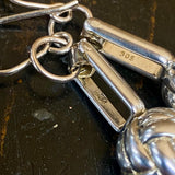 Upcycled cuff link silver knot earrings