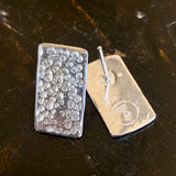 Sterling silver panel studs.