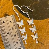 Triple fine silver butterfly drop earrings