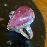 Single large red tourmaline and diamond silver ring