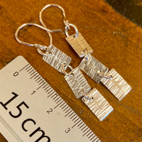 Articulated fine silver panel earrings