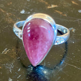 Single large red tourmaline and diamond silver ring