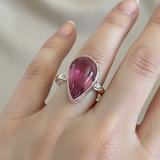 Single large red tourmaline and diamond silver ring